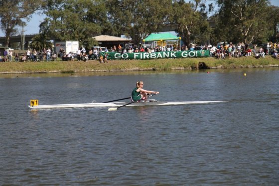 Briley racing in her single scull